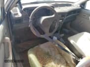 ✅ 1992 Pontiac Lemans • VIN: KL2TN5467NB324622 • Lot: 47321325. Wystawiony na Copart z przebiegiem 173 408 mil. Bezpłatny archiwum sprzedaży aukcyjnych z USA i szczegółowy raport historii pojazdu na DreamBid. Zdjęcie 8.