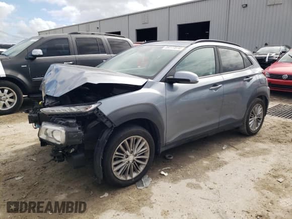 ✅ 2018 Hyundai Kona SEL • VIN: KM8K62AA0JU101040 • Лот: 39777074. Опубликован ранее на Copart с пробегом 186 018 миль. Бесплатный доступ к архиву аукционных продаж из США и подробный отчёт об истории автомобиля на DreamBid. Изображение 1.