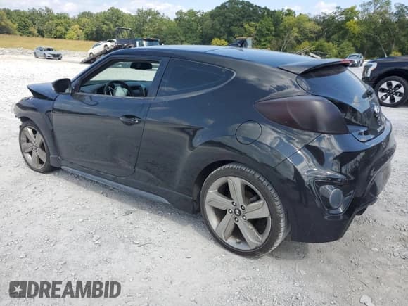 ✅ 2013 Hyundai Veloster Turbo • VIN: KMHTC6AE1DU143762 • Lot: 71797174. Wystawiony na Copart z przebiegiem 162 405 mil. Bezpłatny archiwum sprzedaży aukcyjnych z USA i szczegółowy raport historii pojazdu na DreamBid. Zdjęcie 2.