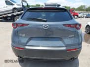 ✅ 2022 Mazda CX-30 S Carbon Edition • VIN: 3MVDMBCL6NM410330 • Lot: 42107426. Listed on IAAI with 30,277 mi. Free auction sales archive from the USA and detailed vehicle history report at DreamBid. Image 17.