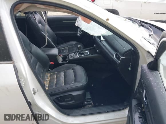 ✅ 2021 Mazda CX-5 Touring • VIN: JM3KFBCM7M0477474 • Lot: 43434996. Listed on IAAI with 76,683 mi. Free auction sales archive from the USA and detailed vehicle history report at DreamBid. Image 5.