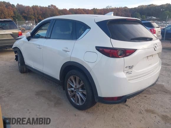 ✅ 2019 Mazda CX-5 Grand Touring • VIN: JM3KFBDM1K0650496 • Lot: 43483224. Listed on IAAI with 107,358 mi. Free auction sales archive from the USA and detailed vehicle history report at DreamBid. Image 3.