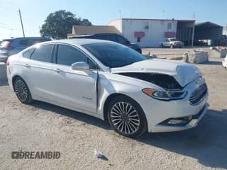 ✅ 2017 Ford Fusion Hybrid Titanium • VIN: 3FA6P0RU1HR138028 • Lot: 43725051. Listed on IAAI with 85,361 mi. Free auction sales archive from the USA and detailed vehicle history report at DreamBid. Image 1.