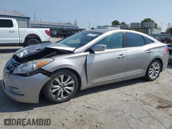 ✅ 2013 Hyundai Azera • VIN: KMHFG4JG3DA288357 • Лот: 67233085. Опубликован ранее на Copart с пробегом 174 588 миль. Бесплатный доступ к архиву аукционных продаж из США и подробный отчёт об истории автомобиля на DreamBid. Изображение 1.