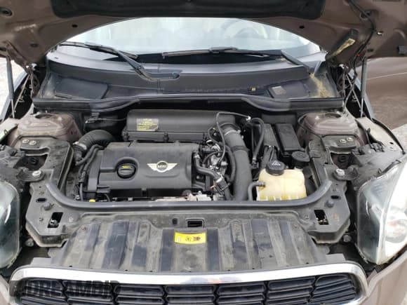 ✅ 2012 MINI Countryman S • VIN: WMWZC5C57CWL60769 • Lot: 59211335. Listed on Copart with 113,737 mi. Free auction sales archive from the USA and detailed vehicle history report at DreamBid. Image 12.