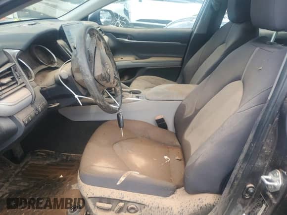 2023 Toyota Camry LE z VIN 4T1C11BK6PU102562, wystawiony jako Copart lot #65087875 z przebiegiem Nie podano mil oraz Szkoda całkowita • Salvage title. Historia ofert i sprzedaży dostępna na DreamBid. Obrazek 7.