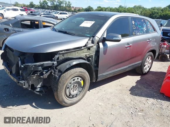 ✅ 2012 Kia Sorento LX • VIN: 5XYKT3A19CG216792 • Lot: 43083958. Listed on IAAI with 164,454 mi. Free auction sales archive from the USA and detailed vehicle history report at DreamBid. Image 2.