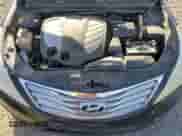 2012 Hyundai Azera z VIN KMHFH4JG3CA124778, wystawiony jako Copart lot #45534435 z przebiegiem 196 084 mil mil oraz Szkoda całkowita • Salvage title. Historia ofert i sprzedaży dostępna na DreamBid. Obrazek 11.