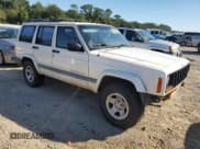 ✅ 2001 Jeep Cherokee Sport • VIN: 1J4FT48S61L576779 • Lot: 86999455. Listed on Copart with 245,218 mi. Free auction sales archive from the USA and detailed vehicle history report at DreamBid. Image 4.