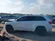 2022 Jeep Grand Cherokee Laredo E with VIN 1C4RJEAGXNC127857, listed as a IAAI auction lot 43202403 with 66,201 mi miles and . Bid and sale history available at DreamBid. Image 14.