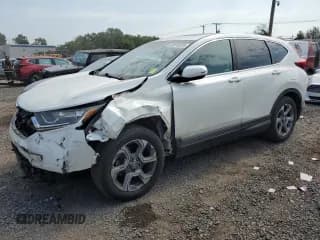 ✅ 2018 Honda CR-V EX-L • VIN: 2HKRW1H83JH518761 • Лот: 82075875. Опубликован ранее на Copart с пробегом 95 505 миль. Бесплатный доступ к архиву аукционных продаж из США и подробный отчёт об истории автомобиля на DreamBid. Изображение 1.