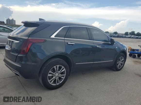 ✅ 2023 Cadillac XT5 FWD Premium Luxury • VIN: 1GYKNCRS1PZ164664 • Lot: 61396935. Listed on Copart with 57,854 mi. Free auction sales archive from the USA and detailed vehicle history report at DreamBid. Image 3.