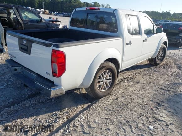 ✅ 2019 Nissan Frontier SL • VIN: 1N6AD0ER0KN740702 • Lot: 43360402. Listed on IAAI with 142,173 mi. Free auction sales archive from the USA and detailed vehicle history report at DreamBid. Image 4.