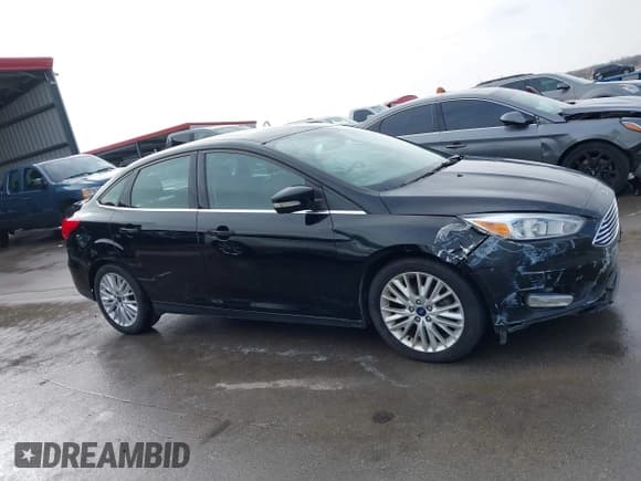 ✅ 2017 Ford Focus Titanium • VIN: 1FADP3J26HL267951 • Lot: 43728220. Listed on IAAI with 84,043 mi. Free auction sales archive from the USA and detailed vehicle history report at DreamBid. Image 13.