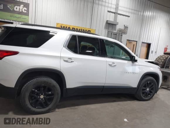 2019 Chevrolet Traverse LT Cloth z VIN 1GNEVGKW1KJ298306, wystawiony jako IAAI lot #43302460 z przebiegiem 76 785 mil mil oraz . Historia ofert i sprzedaży dostępna na DreamBid. Obrazek 13.