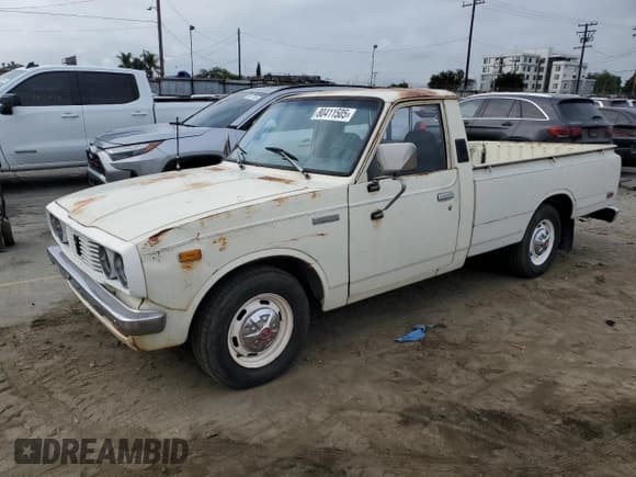 ✅ 1978 Toyota Pickup • VIN: RN28174597 • Lot: 80411505. Listed on Copart with 306,167 mi. Free auction sales archive from the USA and detailed vehicle history report at DreamBid. Image 1.