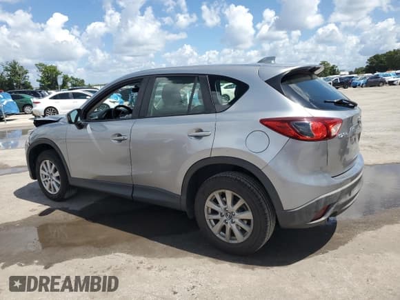 ✅ 2014 Mazda CX-5 Sport • VIN: JM3KE2BE5E0425324 • Лот: 69742435. Опубликован ранее на Copart с пробегом 108 288 миль. Бесплатный доступ к архиву аукционных продаж из США и подробный отчёт об истории автомобиля на DreamBid. Изображение 2.