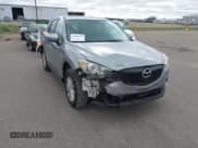 ✅ 2014 Mazda CX-5 Touring • VIN: JM3KE4CY4E0380252 • Lot: 43510717. Wystawiony na IAAI z przebiegiem 207 051 mil. Bezpłatny archiwum sprzedaży aukcyjnych z USA i szczegółowy raport historii pojazdu na DreamBid. Zdjęcie 6.