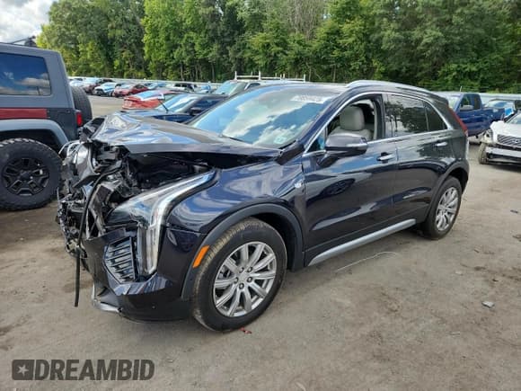 ✅ 2022 Cadillac XT4 FWD Premium Luxury • VIN: 1GYFZCR40NF169909 • Lot: 70859425. Listed on Copart with Not provided. Free auction sales archive from the USA and detailed vehicle history report at DreamBid. Image 1.