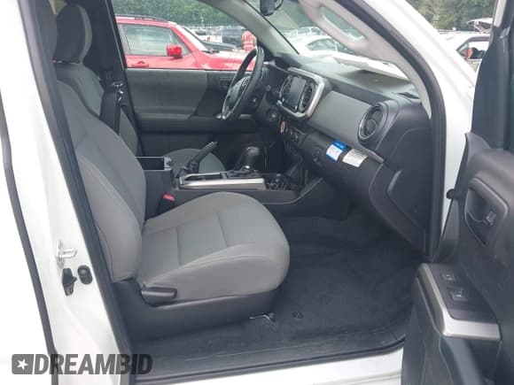 ✅ 2021 Toyota Tacoma SR • VIN: 3TYRZ5CN8MT008114 • Lot: 42993504. Listed on IAAI with 24,344 mi. Free auction sales archive from the USA and detailed vehicle history report at DreamBid. Image 5.