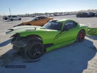 ✅ 1994 Dodge Viper • VIN: 1B3BR65E8RV101309 • Lot: 88095035. Listed on Copart with 70,768 mi. Free auction sales archive from the USA and detailed vehicle history report at DreamBid. Image 1.