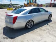 ✅ 2013 Cadillac XTS Livery • VIN: 2G61W5S38D9110591 • Lot: 43156880. Listed on IAAI with 420,217 mi. Free auction sales archive from the USA and detailed vehicle history report at DreamBid. Image 4.