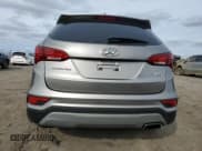 ✅ 2018 Hyundai Santa Fe 2.4L • VIN: 5NMZUDLB7JH101781 • Лот: 46034614. Опубликован ранее на Copart с пробегом 91 341 миль. Бесплатный доступ к архиву аукционных продаж из США и подробный отчёт об истории автомобиля на DreamBid. Изображение 6.