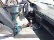 ✅ 1994 Mazda Protege DX • VIN: JM1BG2249R0774647 • Lot: 42093689. Wystawiony na IAAI z przebiegiem 89 376 mil. Bezpłatny archiwum sprzedaży aukcyjnych z USA i szczegółowy raport historii pojazdu na DreamBid. Zdjęcie 5.