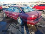 ✅ 1993 Ford Taurus GL • VIN: 1FALP52U5PG307662 • Lot: 43924999. Wystawiony na IAAI z przebiegiem 5 112 mil. Bezpłatny archiwum sprzedaży aukcyjnych z USA i szczegółowy raport historii pojazdu na DreamBid. Zdjęcie 3.