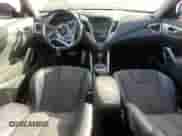 2012 Hyundai Veloster w/Red Int z VIN KMHTC6AD9CU044547, wystawiony jako Copart lot #72633624 z przebiegiem 69 261 mil mil oraz Szkoda całkowita • Salvage title. Historia ofert i sprzedaży dostępna na DreamBid. Obrazek 8.