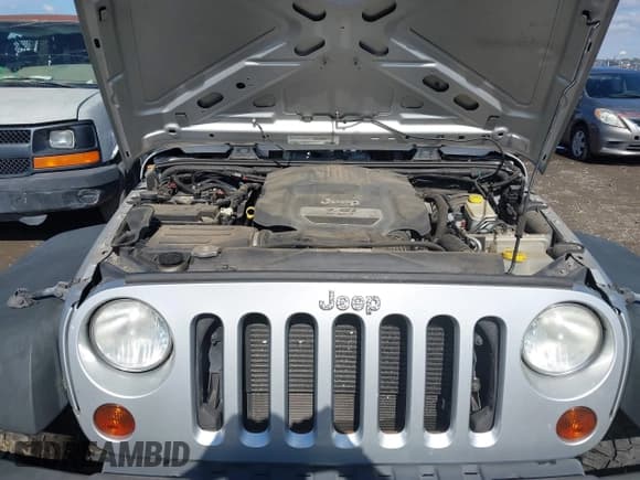✅ 2012 Jeep Wrangler Unlimited Sport • VIN: 1C4HJWDG0CL189603 • Lot: 43586706. Wystawiony na IAAI z przebiegiem 105 980 mil. Bezpłatny archiwum sprzedaży aukcyjnych z USA i szczegółowy raport historii pojazdu na DreamBid. Zdjęcie 10.