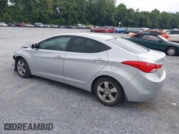 ✅ 2013 Hyundai Elantra GLS • VIN: KMHDH4AE8DU829579 • Lot: 42940329. Listed on IAAI with 153,115 mi. Free auction sales archive from the USA and detailed vehicle history report at DreamBid. Image 3.