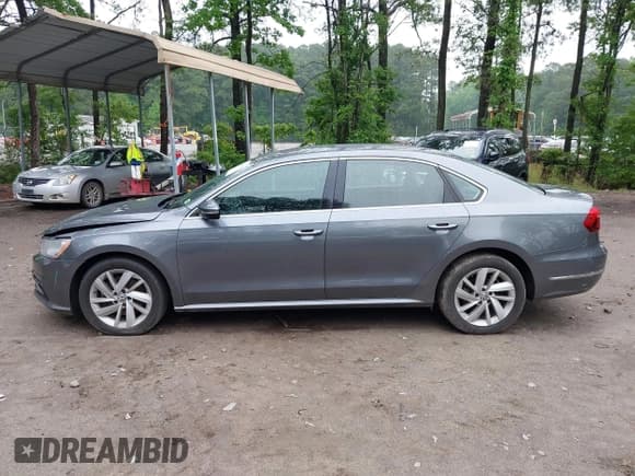 ✅ 2018 Volkswagen Passat SE • VIN: 1VWBA7A30JC027199 • Lot: 42266836. Listed on IAAI with 94,428 mi. Free auction sales archive from the USA and detailed vehicle history report at DreamBid. Image 14.