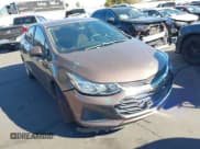 ✅ 2019 Chevrolet Cruze LS • VIN: 1G1BC5SMXK7126656 • Lot: 43546090. Listed on IAAI with 87,531 mi. Free auction sales archive from the USA and detailed vehicle history report at DreamBid. Image 1.