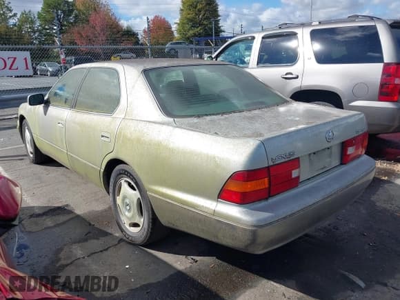 ✅ 2000 Lexus LS 400 • VIN: JT8BH28F7Y0174406 • Lot: 43585985. Listed on IAAI with 328,618 mi. Free auction sales archive from the USA and detailed vehicle history report at DreamBid. Image 3.