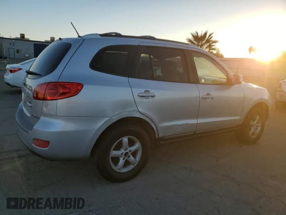 ✅ 2007 Hyundai Santa Fe GLS • VIN: 5NMSG13D97H092227 • Lot: 82208244. Listed on Copart with 200,094 mi. Free auction sales archive from the USA and detailed vehicle history report at DreamBid. Image 3.