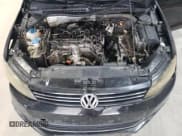 ✅ 2013 Volkswagen Jetta TDI w/Premium/Nav • VIN: 3VW3L7AJ2DM292383 • Lot: 66886315. Listed on Copart with 193,519 mi. Free auction sales archive from the USA and detailed vehicle history report at DreamBid. Image 11.