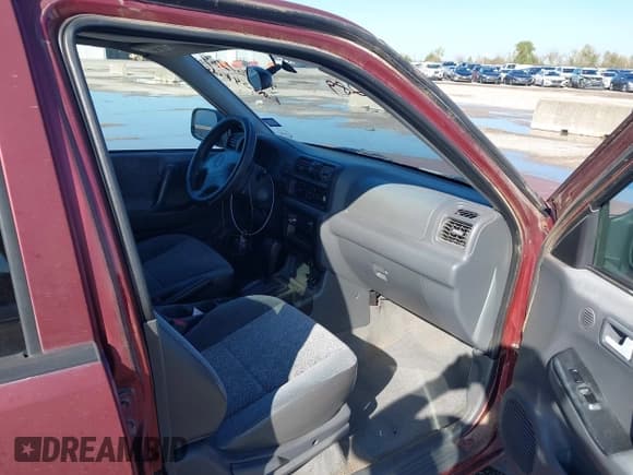 ✅ 2002 Isuzu Rodeo S • VIN: 4S2CK58W524328785 • Lot: 43751289. Listed on IAAI with 186,198 mi. Free auction sales archive from the USA and detailed vehicle history report at DreamBid. Image 5.