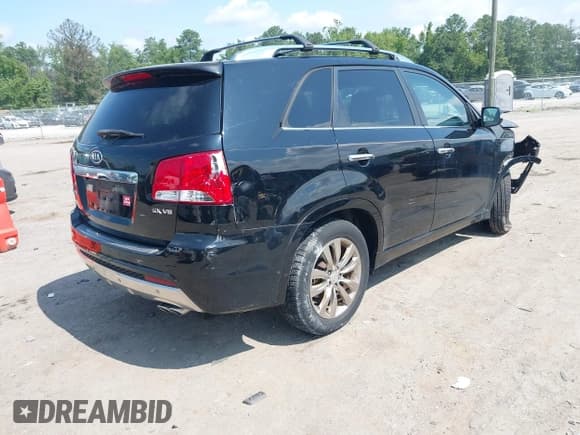 ✅ 2012 Kia Sorento SX • VIN: 5XYKW4A2XCG232506 • Лот: 42740284. Опубликован ранее на IAAI с пробегом 140 990 миль. Бесплатный доступ к архиву аукционных продаж из США и подробный отчёт об истории автомобиля на DreamBid. Изображение 4.