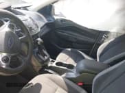 ✅ 2015 Ford Escape S • VIN: 1FMCU0F7XFUB44027 • Lot: 43251455. Listed on IAAI with 143,721 mi. Free auction sales archive from the USA and detailed vehicle history report at DreamBid. Image 5.