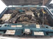 ✅ 1997 Ford Ranger XLT • VIN: 1FTCR10A7VTA87760 • Lot: 90682325. Wystawiony na Copart z przebiegiem 143 812 mil. Bezpłatny archiwum sprzedaży aukcyjnych z USA i szczegółowy raport historii pojazdu na DreamBid. Zdjęcie 11.