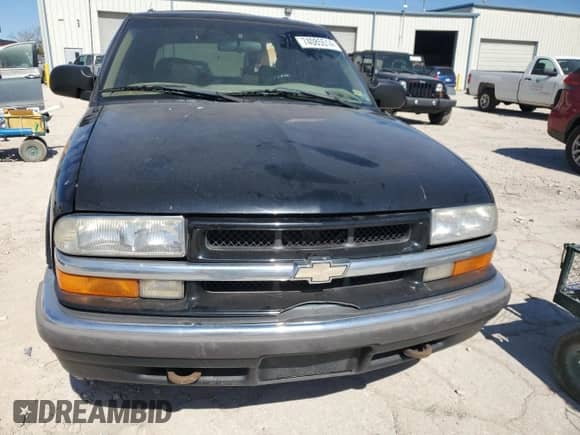 2001 Chevrolet Blazer LT z VIN 1GNDT13W812221860, wystawiony jako Copart lot #74085514 z przebiegiem Nie podano mil oraz Szkoda całkowita • Salvage title. Historia ofert i sprzedaży dostępna na DreamBid. Obrazek 5.
