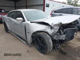 ✅ 2012 Dodge Charger Police • VIN: 2C3CDXAT1CH305496 • Lot: 43428332. Listed on IAAI with 249,533 mi. Free auction sales archive from the USA and detailed vehicle history report at DreamBid. Image 1.