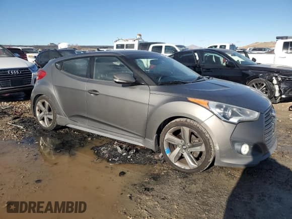 ✅ 2014 Hyundai Veloster Turbo • VIN: KMHTC6AE0EU209218 • Lot: 83717664. Wystawiony na Copart z przebiegiem 119 646 mil. Bezpłatny archiwum sprzedaży aukcyjnych z USA i szczegółowy raport historii pojazdu na DreamBid. Zdjęcie 4.