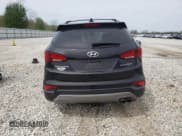 ✅ 2018 Hyundai Santa Fe 2.0T • VIN: 5NMZU4LA7JH082656 • Лот: 50277193. Опубликован ранее на Copart с пробегом 61 670 миль. Бесплатный доступ к архиву аукционных продаж из США и подробный отчёт об истории автомобиля на DreamBid. Изображение 6.