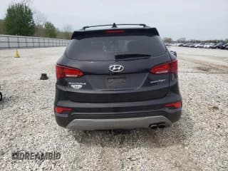 ✅ 2018 Hyundai Santa Fe 2.0T • VIN: 5NMZU4LA7JH082656 • Лот: 50277193. Опубликован ранее на Copart с пробегом 61 670 миль. Бесплатный доступ к архиву аукционных продаж из США и подробный отчёт об истории автомобиля на DreamBid. Изображение 6.