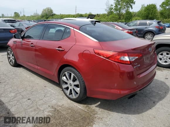 ✅ 2012 Kia Optima SX • VIN: 5XXGR4A64CG070859 • Лот: 67184165. Опубликован ранее на Copart с пробегом 170 772 миль. Бесплатный доступ к архиву аукционных продаж из США и подробный отчёт об истории автомобиля на DreamBid. Изображение 2.