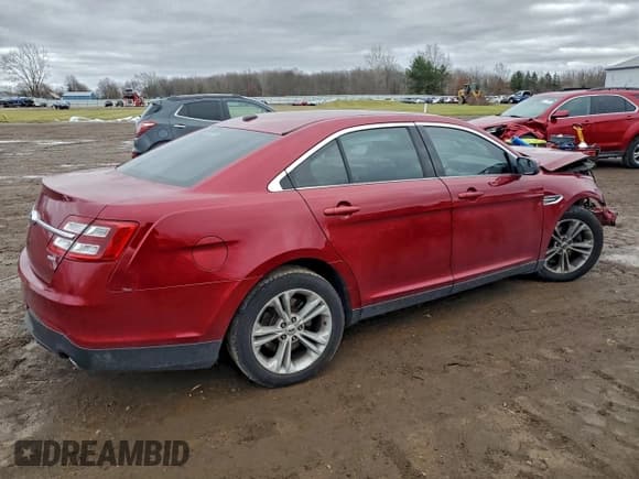 ✅ 2016 Ford Taurus SEL • VIN: 1FAHP2E88GG124498 • Лот: 94717085. Опубликован ранее на Copart с пробегом 128 610 миль. Бесплатный доступ к архиву аукционных продаж из США и подробный отчёт об истории автомобиля на DreamBid. Изображение 3.