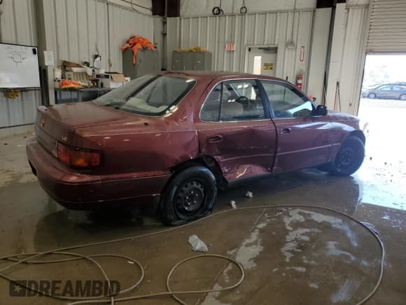 ✅ 1996 Toyota Camry DX • VIN: JT2BG12K3T0417697 • Лот: 73537244. Опубликован ранее на Copart с пробегом 183 208 миль. Бесплатный доступ к архиву аукционных продаж из США и подробный отчёт об истории автомобиля на DreamBid. Изображение 3.