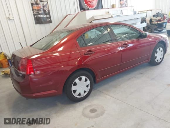 ✅ 2005 Mitsubishi Galant LS • VIN: 4A3AB36S05E020927 • Лот: 42865002. Опубликован ранее на IAAI с пробегом 141 569 миль. Бесплатный доступ к архиву аукционных продаж из США и подробный отчёт об истории автомобиля на DreamBid. Изображение 4.